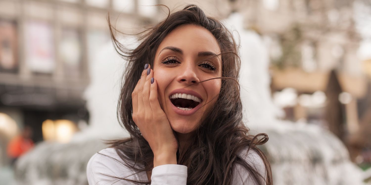 Dedham injectables model mid-laugh