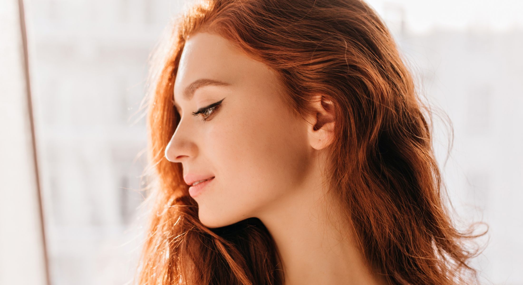 Dedham microneedling model with red hair