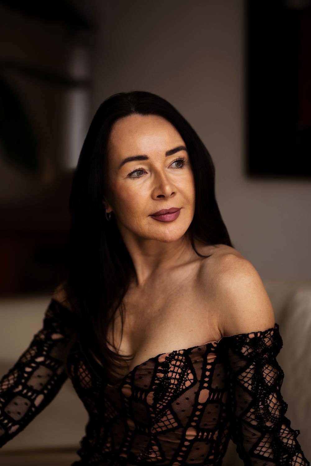 Elegant woman with youthful skin representing expert aesthetic care